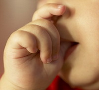 Child Sucking on Thumb at the Pediatric Dentist Office in Casa Grande, Mesa and Chandler, AZ